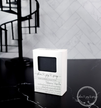 Load image into Gallery viewer, Black soap in white box. Handcrafted Natural Man Soap: Tobacco Vanille is formulated of nourishing botanical oils, cocoa butter and organic coconut milk infused with luxurious silk amino acids and activated charcoal for a deep pore detox. The fragrance profile is a blend of tobacco leaf, tonka bean, vanilla, cocoa, and sweet woods. Skin Joy Soap Murfreesboro Tennessee