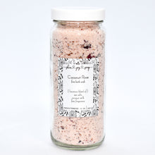 Load image into Gallery viewer, Rose pink bath soak in glass jar. Coconut Rose Bath Soak is a luxurious blend of sea salts and organic coconut milk. The best selling scent is the same fragrance as our companion soap bar Coconut Rose Soap Supreme - a sweet and soft mix of coconut, candy apple, raspberry, red currant, tulip, freesia, heliotrope, rose, cashmere musk, vanilla, and amber. Skin Joy Soap Murfreesboro Tennessee