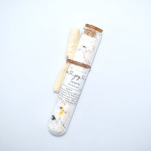 Load image into Gallery viewer, Luxurious bath salt soak with botanicals in glass tube. Serenity Bath Soak is a relaxing blend of sea salts and epsom salt. The calming aroma is crafted of Bulgarian lavender and geranium essential oils blended with fine fragrance to elevate the bathing ritual...we really should have named this one Mellow Mood.