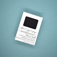 Load image into Gallery viewer, Black soap in white box. Handcrafted Natural Man Soap: Tobacco Vanille is formulated of nourishing botanical oils, cocoa butter and organic coconut milk infused with luxurious silk amino acids and activated charcoal for a deep pore detox. The fragrance profile is a blend of tobacco leaf, tonka bean, vanilla, cocoa, and sweet woods. Skin Joy Soap Murfreesboro Tennessee