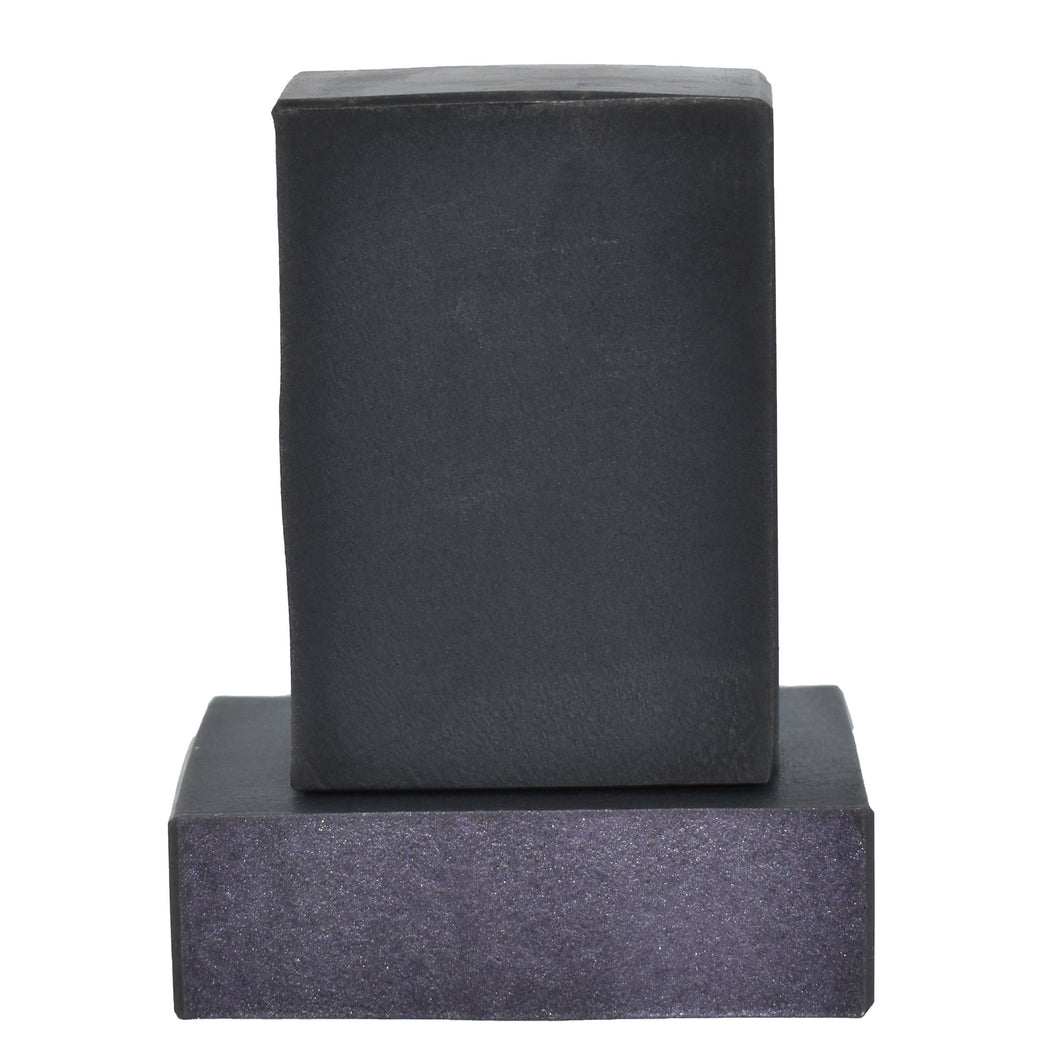 Activated charcoal black artisan soap bars with dark purple top