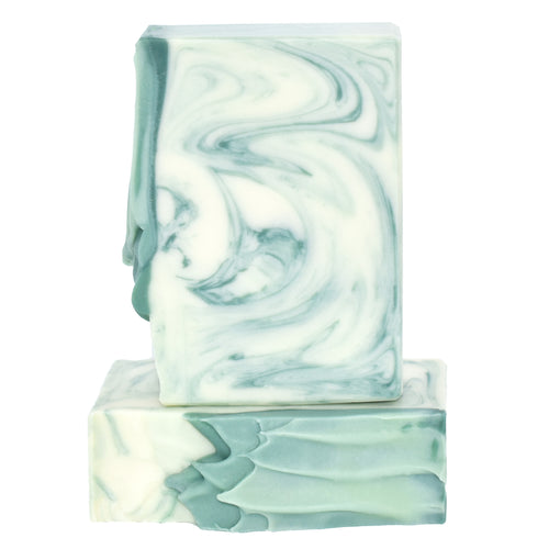 White and green swirled artisan soap bar.  Handcrafted Luxury Natural Soap: A Soap Supreme bar, Eucalyptus Spearmint is formulated of nourishing botanical oils and cocoa butter, infused with organic coconut milk and luxurious silk fibers. This spa scent smells of eucalyptus, spearmint, and uninterrupted relaxation. Skin Joy Soap Murfreesboro Tennessee
