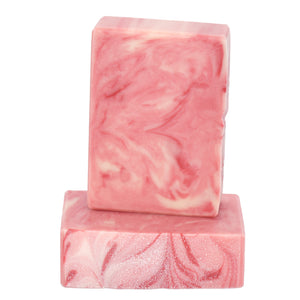 Red and white swirled artisan soap bars.  Handcrafted Natural Soap: Peppermint Bark is formulated of nourishing botanical oils and cocoa butter, infused with organic coconut milk and luxurious silk fibers.  We love mint year round but peppermint is the quintessential winter scent.  Skin Joy Soap Murfreesboro Tennessee 