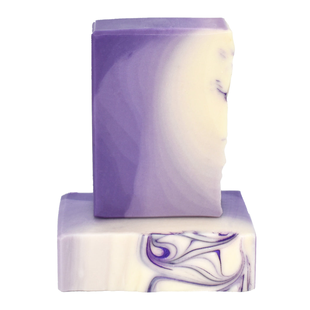 White and purple ombre bar soap.  Handcrafted Luxurious Natural Bar Soap: A Soap Supreme best seller, Lavender Sage is formulated of nourishing botanical oils and cocoa butter infused with organic coconut milk and luxurious silk fibers.  This essential oil fragrance oil blend is a classic clean herbaceous dream. Skin Joy Soap Murfreesboro Tennessee