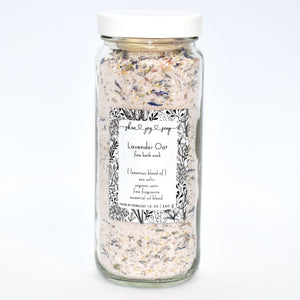 Lavender Botanical Bath Salt Soak in glass jar.  Lavender Oat Bath Soak is a gentle blend of sea salts and colloidal oats.  This best selling scent is the same lovely fragrance as our soap supreme bar “Lavender Sage” -  top notes of rosemary and thyme, heart notes of lavender and sage, and base notes of powder and musk, this essential oil fragrance oil blend is a classic clean herbaceous dream.   Skin Joy Soap Murfreesboro Tennessee