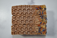 Load image into Gallery viewer, Honey gold bar soap with wildflower botanicals. Handcrafted Natural Soap:, Local Honey&#39;s fragrance profile is sweet and an oh so yummy traditional honey scent – you may even be tempted to lick your bar, but of course we advise against it. Local Honey Joy Bar is formulated of nourishing botanical oils and organic coconut milk infused with turmeric, luxurious silk fibers and 100% pure dark wildflower honey made right here in Tennessee. Skin Joy Soap Murfreesboro Tennessee
