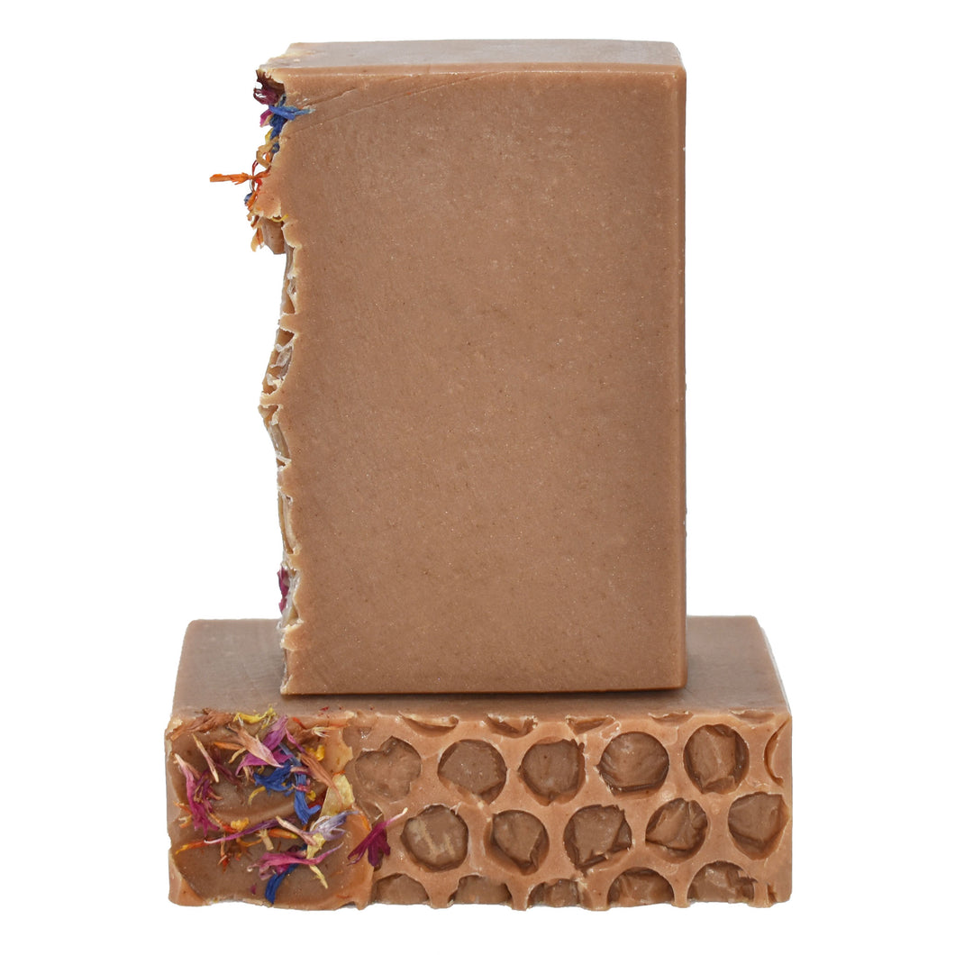 Honey gold bar soap with wildflower botanicals.  Handcrafted Natural Soap:, Local Honey's fragrance profile is sweet and an oh so yummy traditional honey scent – you may even be tempted to lick your bar, but of course we advise against it.  Local Honey Joy Bar is formulated of nourishing botanical oils and organic coconut milk infused with turmeric, luxurious silk fibers and 100% pure dark wildflower honey made right here in Tennessee. Skin Joy Soap Murfreesboro Tennessee