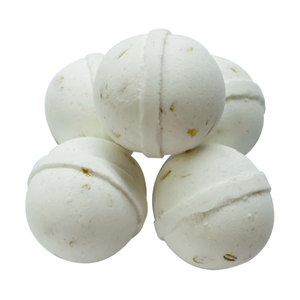 Creamy white bath bombs with oats.  A luxuriously crafted treat, Oatmeal Milk and Honey is sweet and warm and THE house favorite.