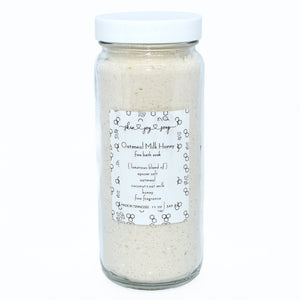 Creamy white bath salt soak in glass jar.  Oatmeal Milk and Honey Bath Soak in 12 oz glass jar.  Skin Joy Soap Murfreesboro Tennessee