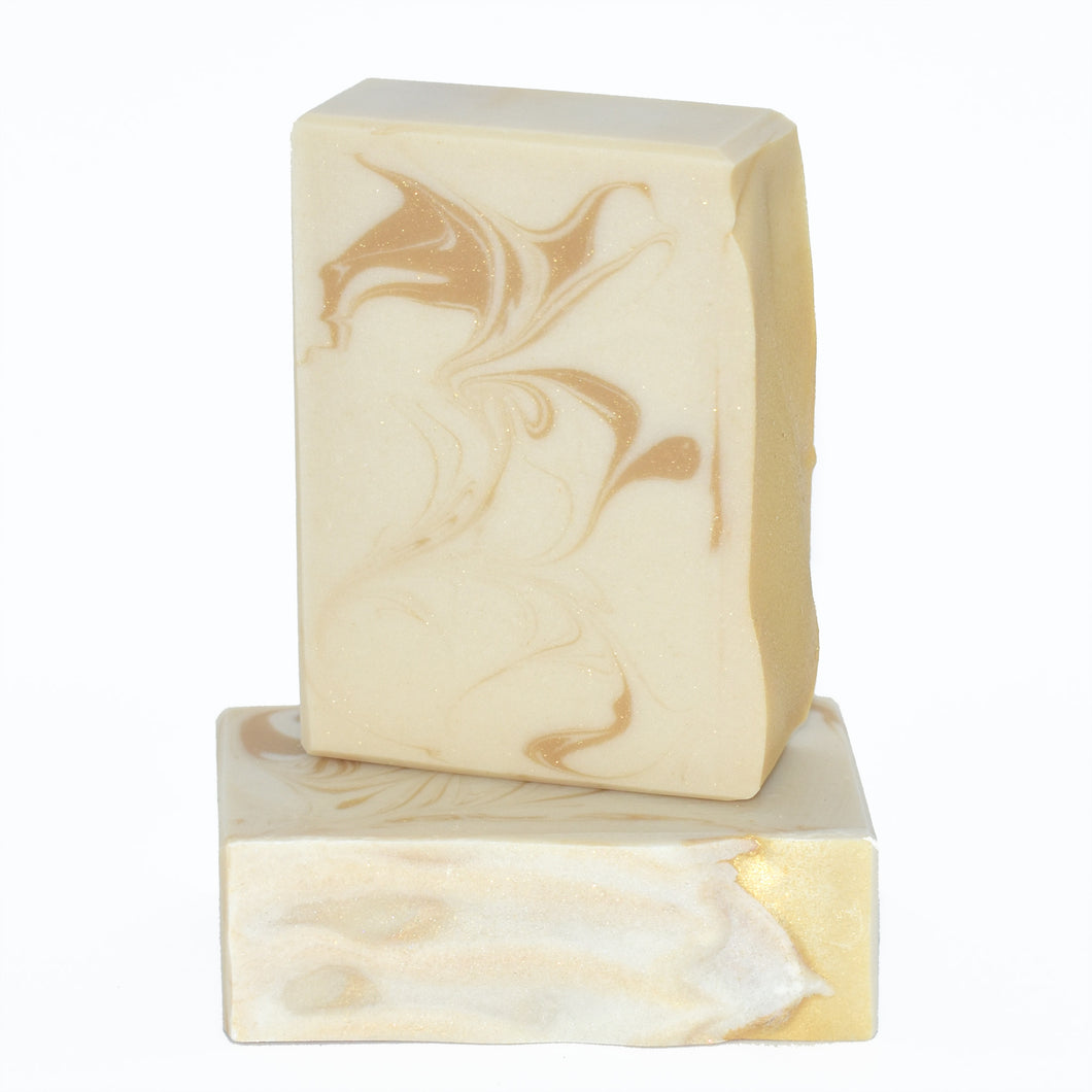 Ivory and gold swirled artisan soap bar. Handcrafted Luxury Natural Soap: A warm, comforting fragrance, PEACE is a sophisticated blend of red apples, berries and cinnamon, reminiscent of sipping warm apple cider next to the hearth on a cold winter day.  A fan-favorite in our winter collection, PEACE Joy Bar is formulated of nourishing botanical oils, organic coconut milk and silk fibers, infused with holiday cheer.       Skin Joy Soap Murfreesboro Tennessee
