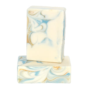 White artisan soap with swirls of blue and gold.  White Tea + Ginger Soap Murfreesboro Tennessee